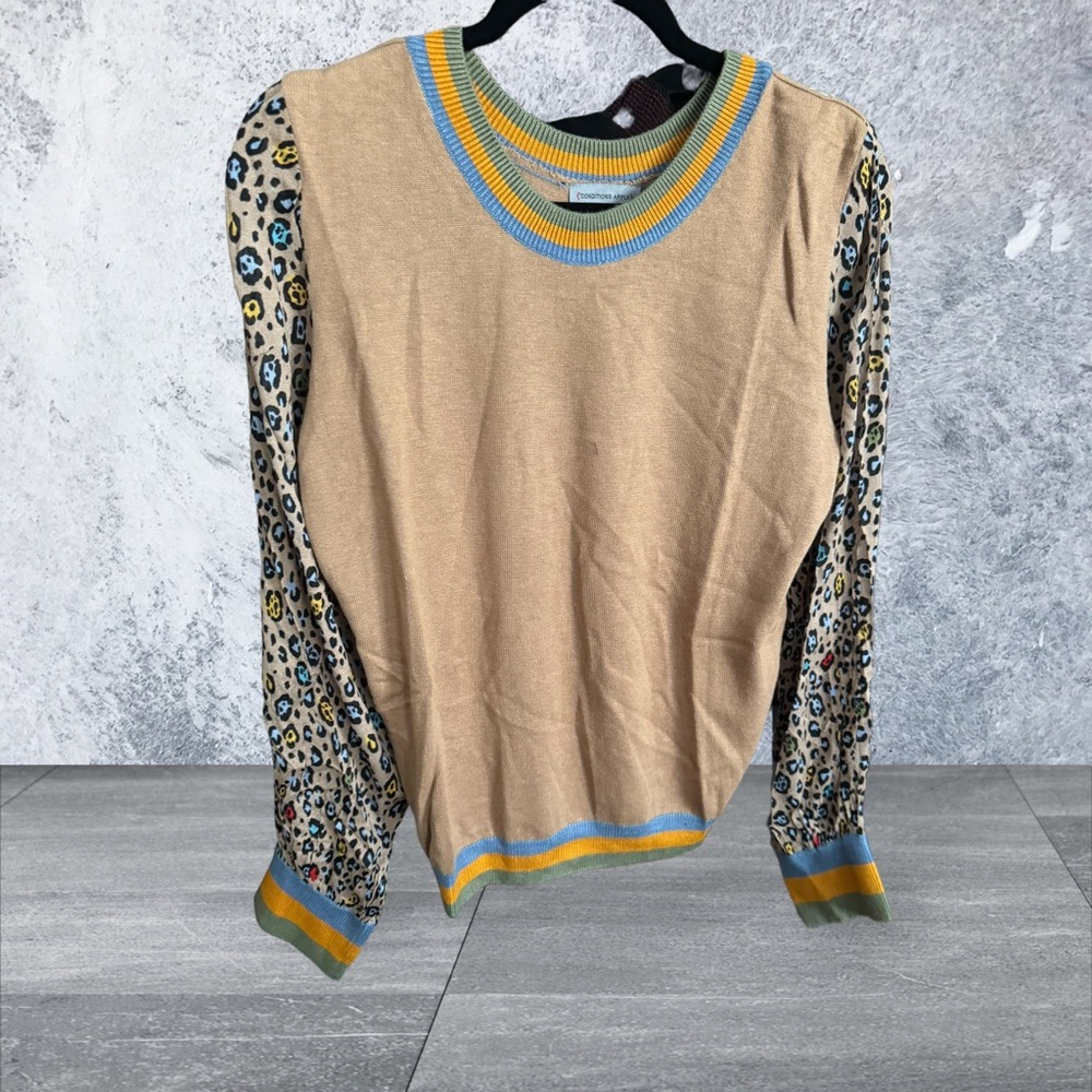CONDITIONS APPLY for Bl^nk London Crew Neck Sweater with animal print sleeves